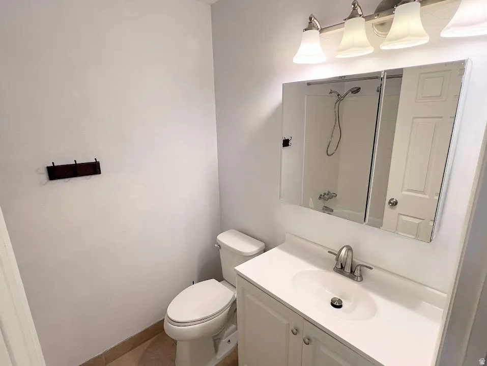 Bathroom featuring toilet and vanity