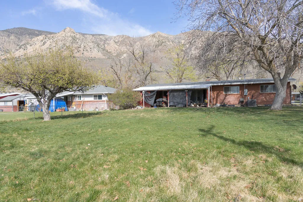 View of yard with a mountain view