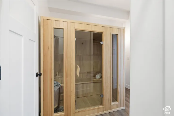 Sauna featuring wood finished floors