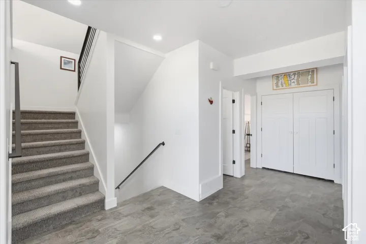 Stairway featuring baseboards