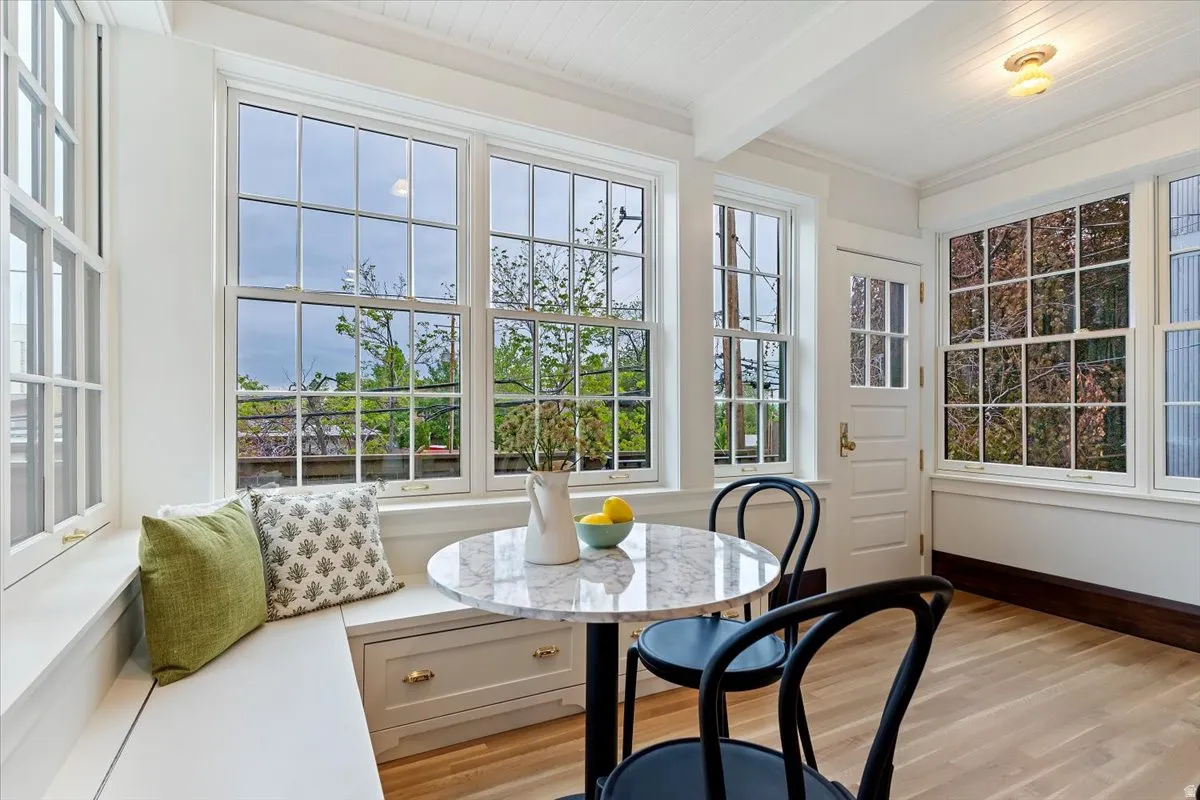Sunroom with beamed ceiling
