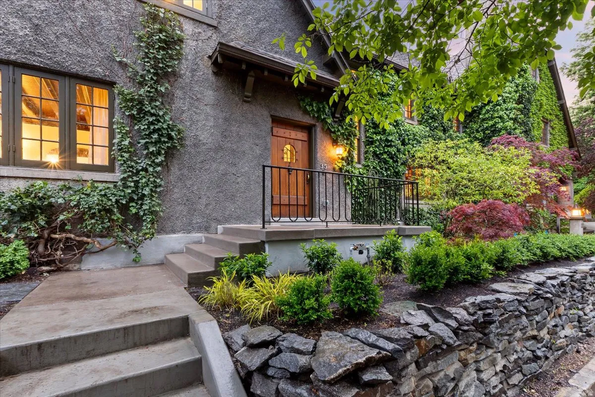 Entrance to property featuring stucco siding