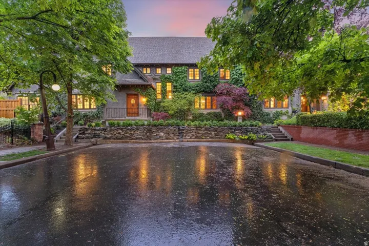 View of front of house featuring a porch and a shingled roof