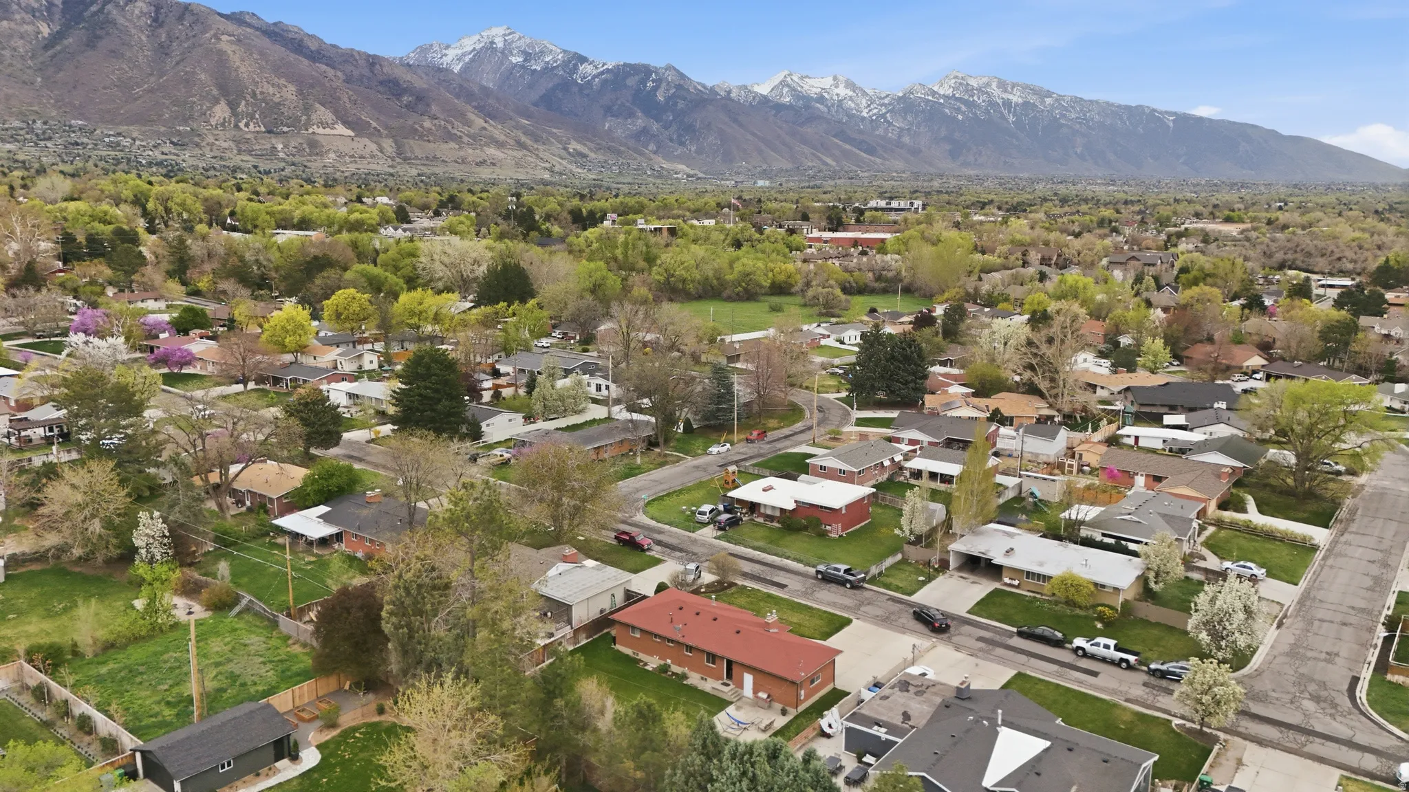Aerial view of residential area with a mountain backdrop