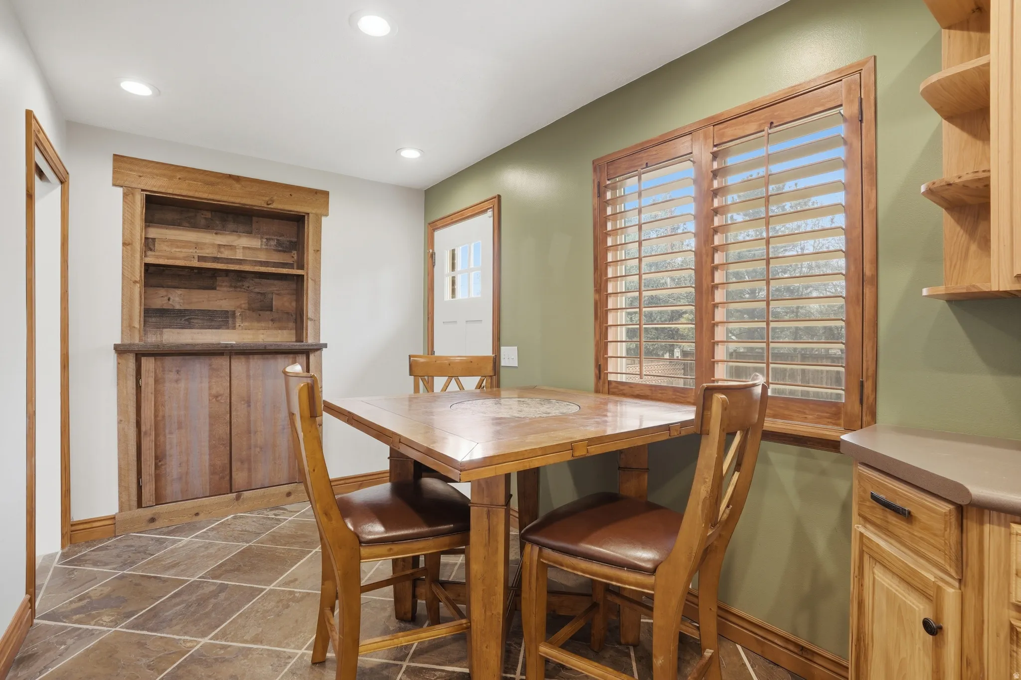 Dining area with recessed lighting
