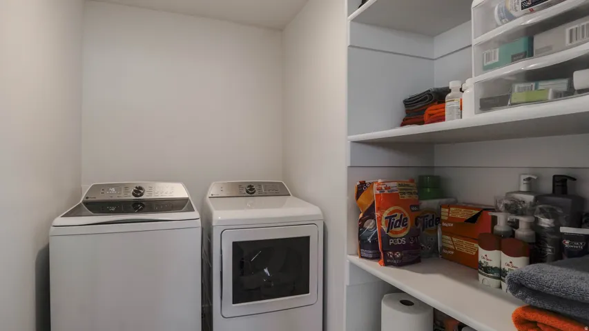 Laundry area featuring washer and clothes dryer