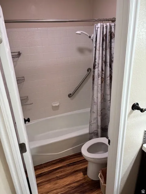 Bathroom featuring shower / bathtub combination and vanity.
