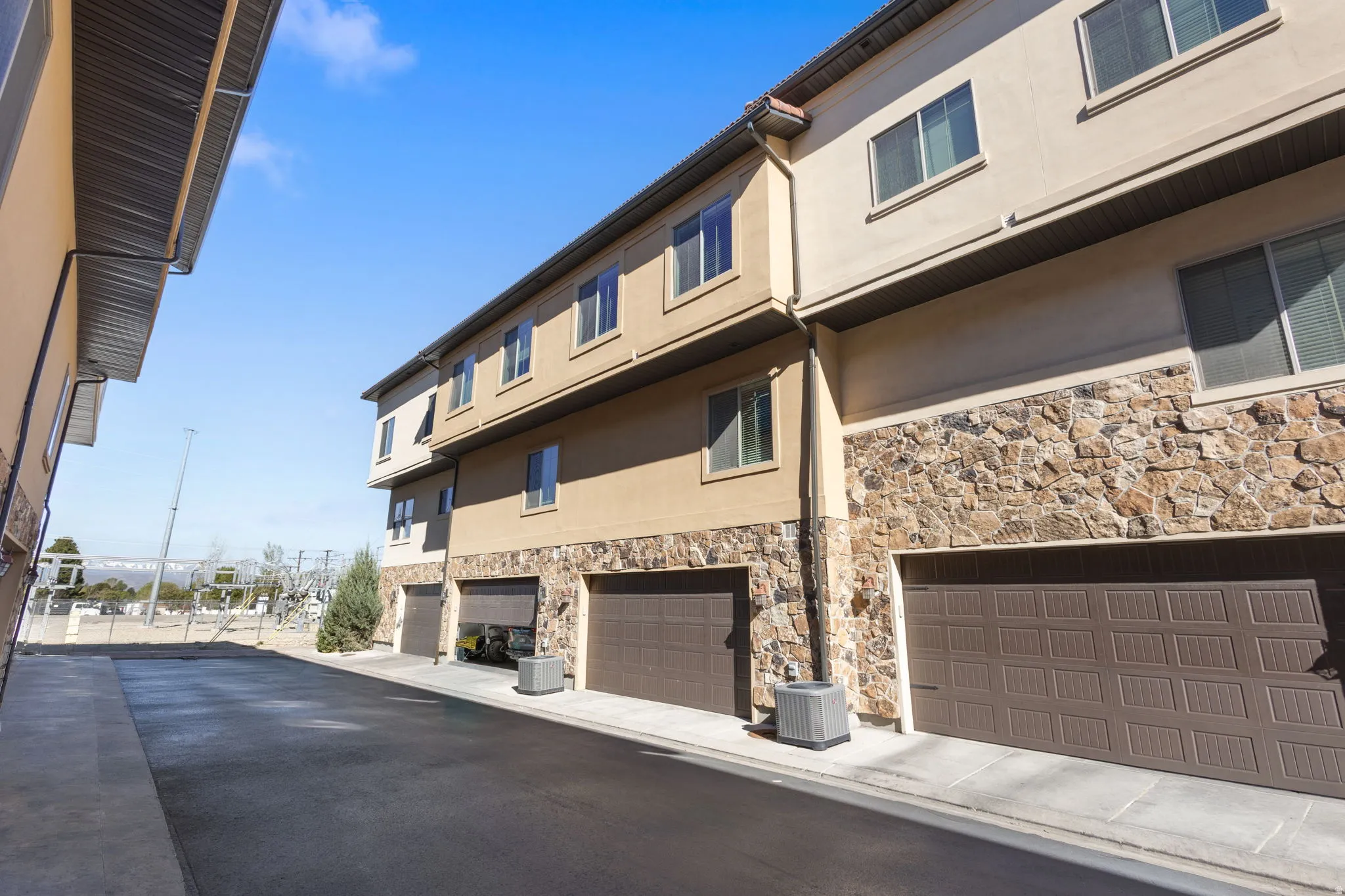 View of property with an attached garage