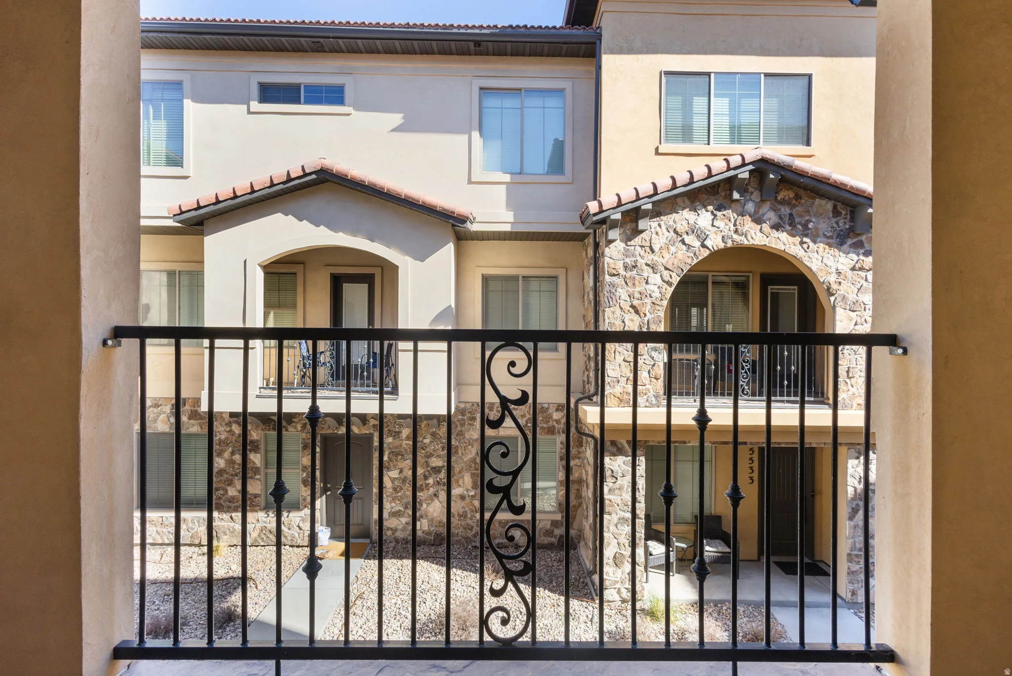 Gate featuring a balcony