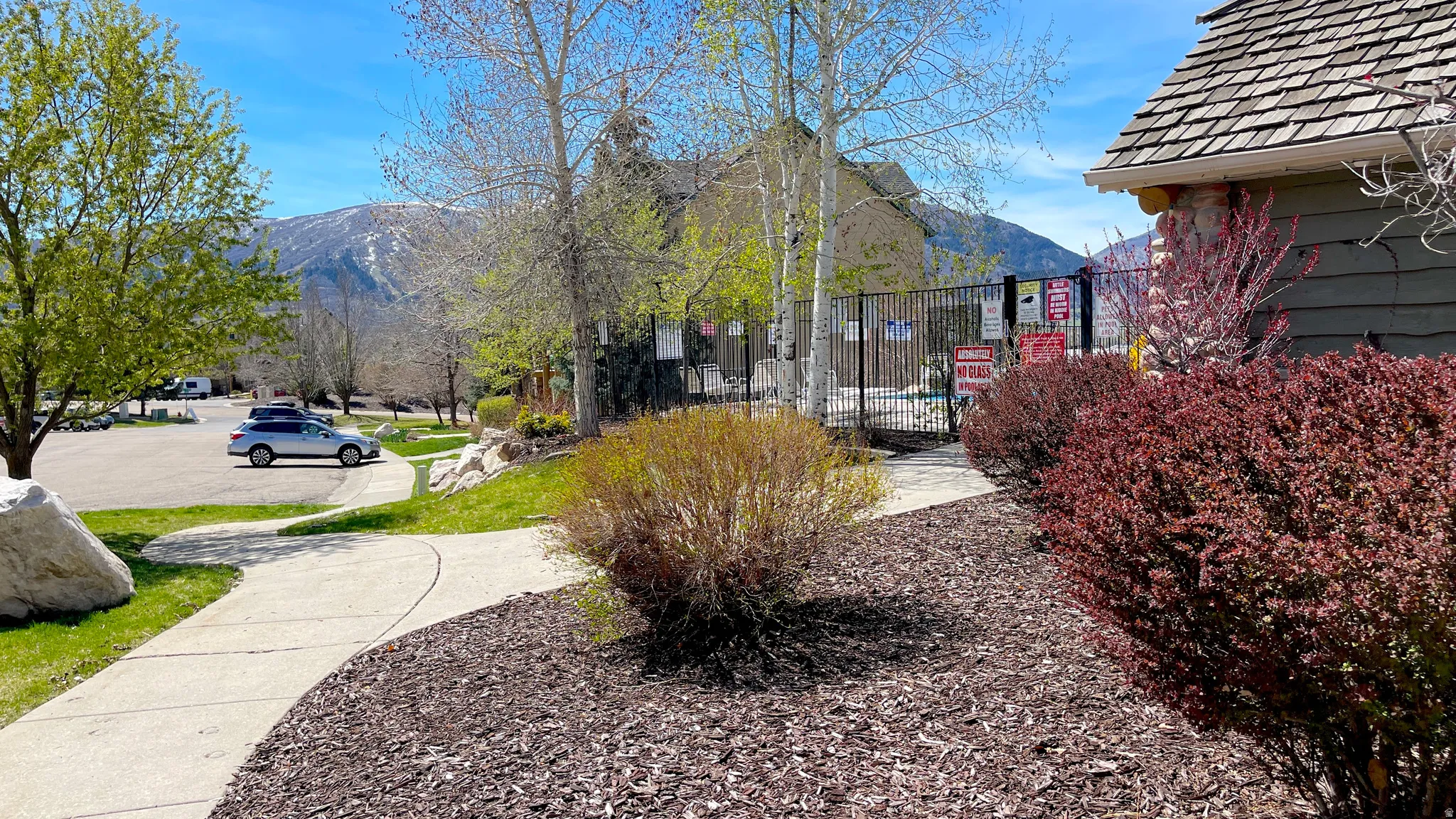 Entrance to pool, sauna, and hot tub directly across from condo