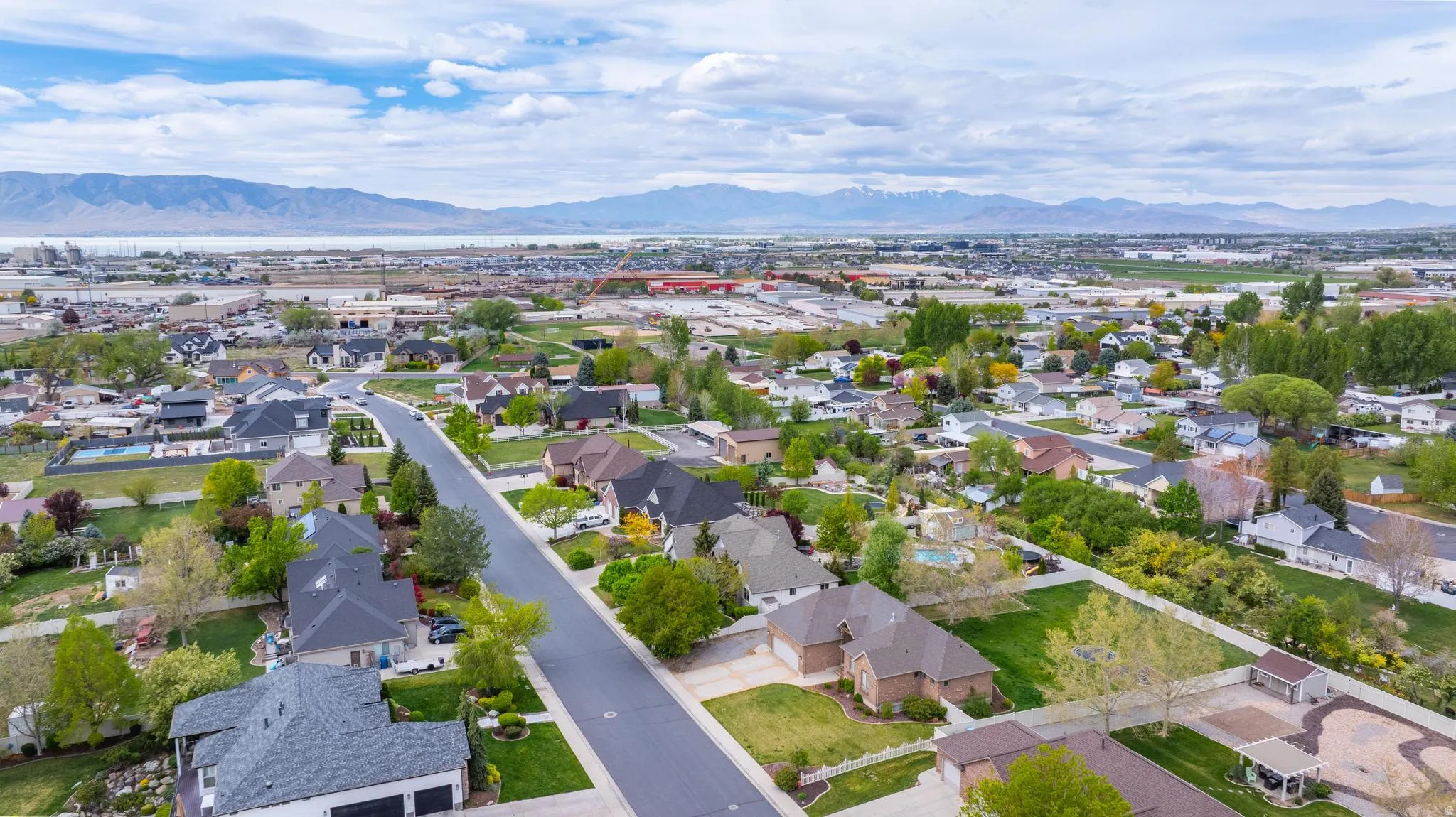 Aerial view of residential area featuring mountains