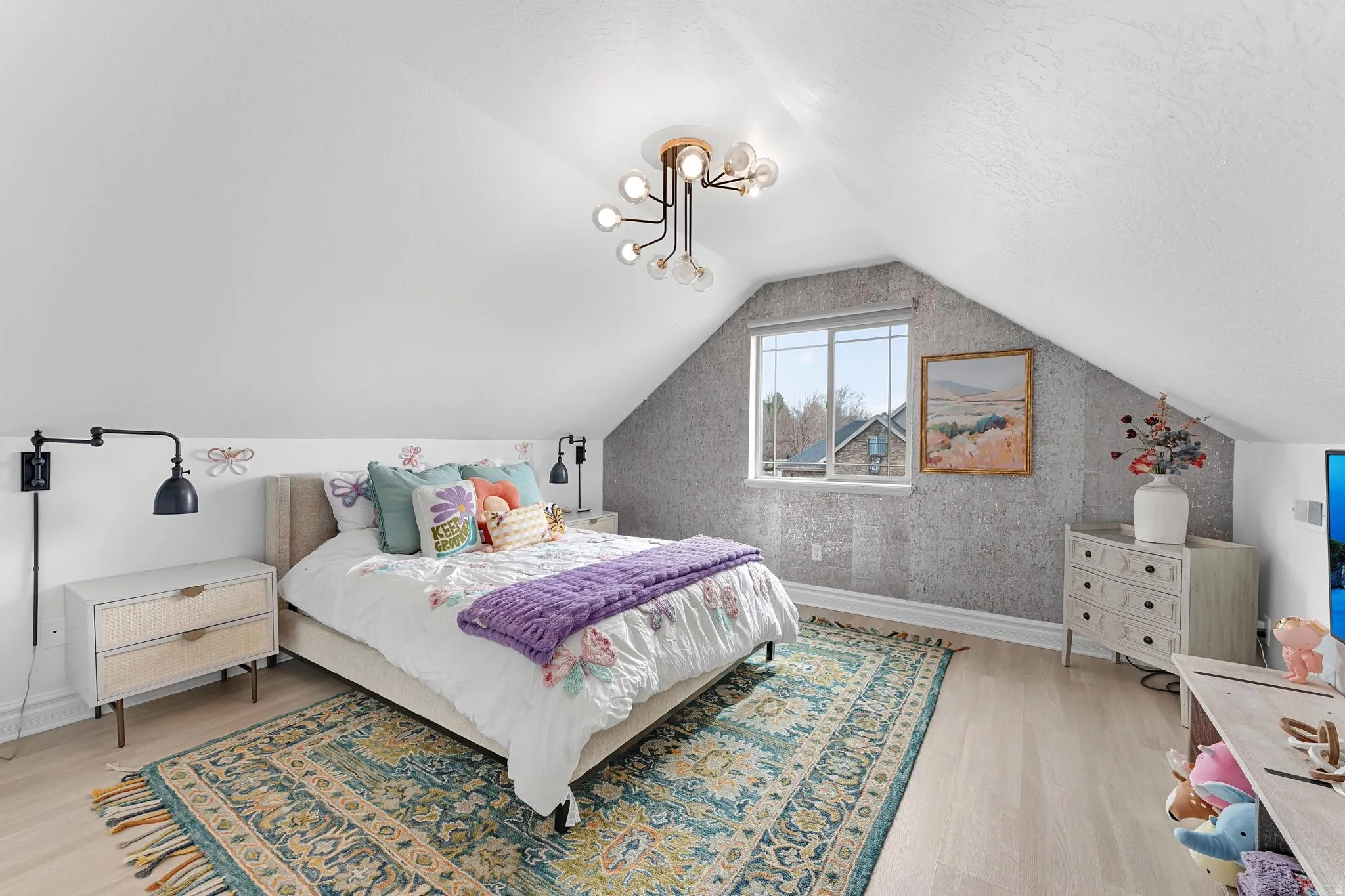 Bedroom featuring baseboards and light wood finished floors