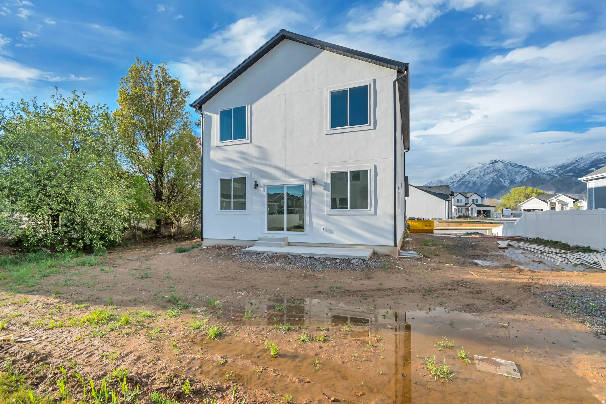 Back of house featuring a mountain view