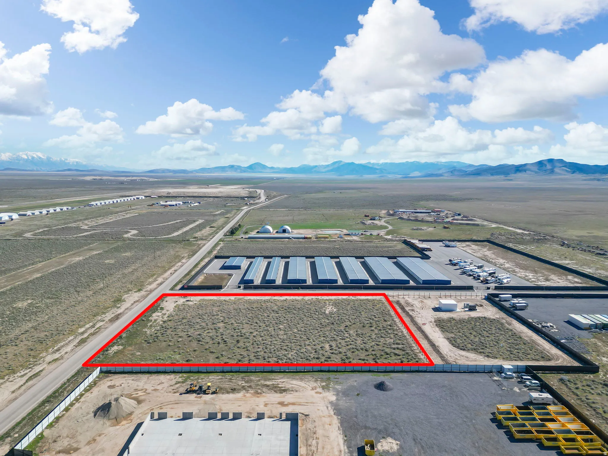 2 parcels available. This is a lot boundary showing 2 lots.  View of rural area featuring property boundaries highlighted and a mountain backdrop