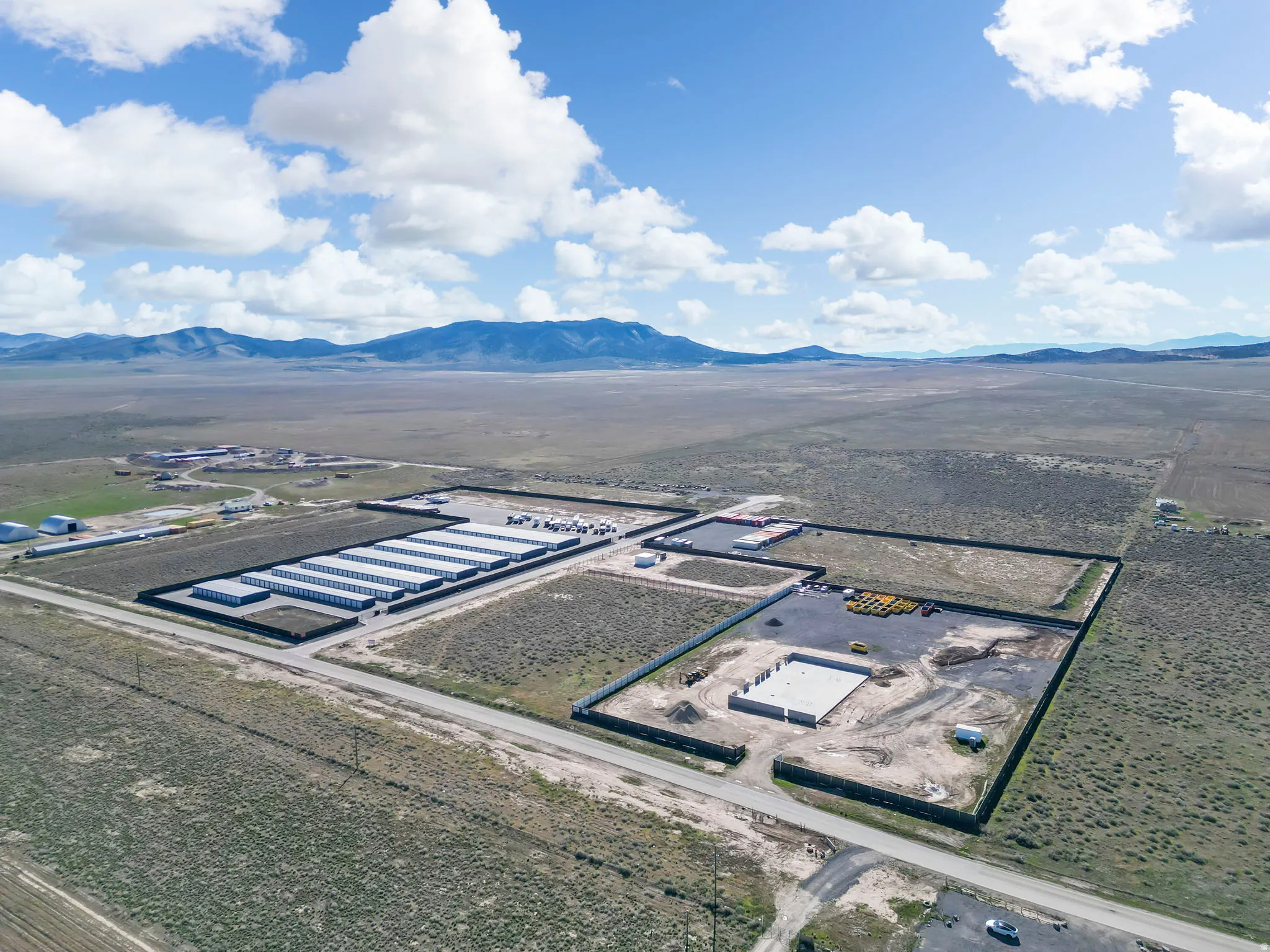 Aerial view of sparsely populated area with mountains