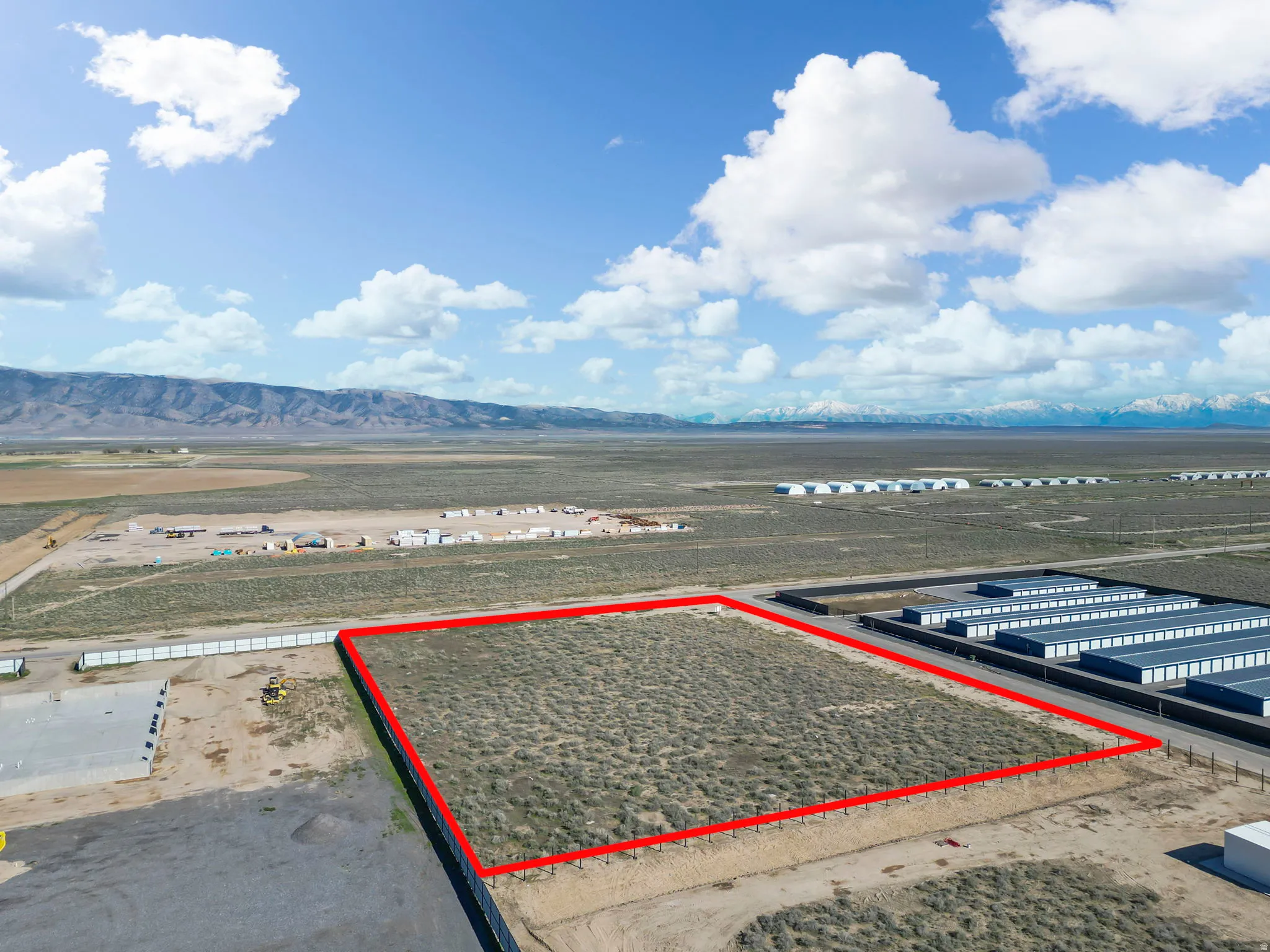 View of property location with property parcel outlined and a mountainous background