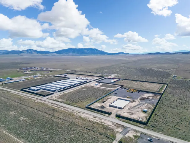 Aerial view of sparsely populated area with mountains
