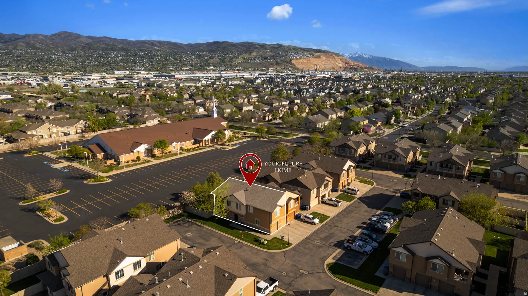 Aerial perspective of suburban area featuring mountains