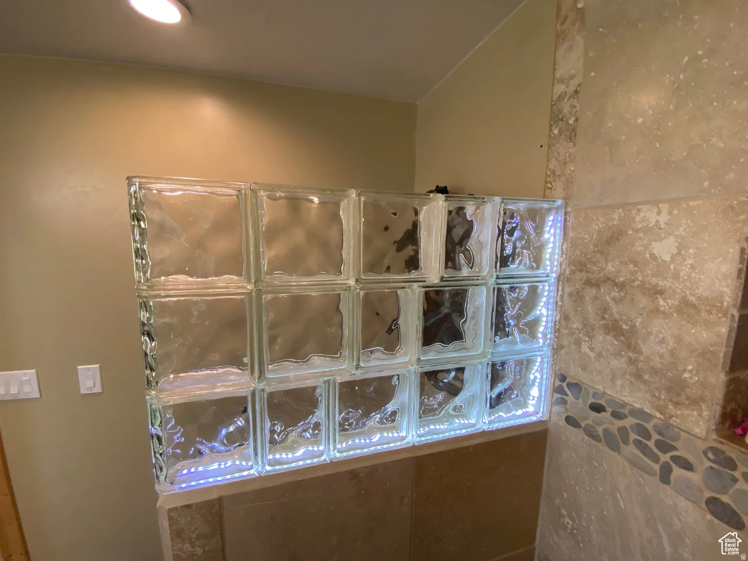 Full bath with recessed lighting and a tile shower