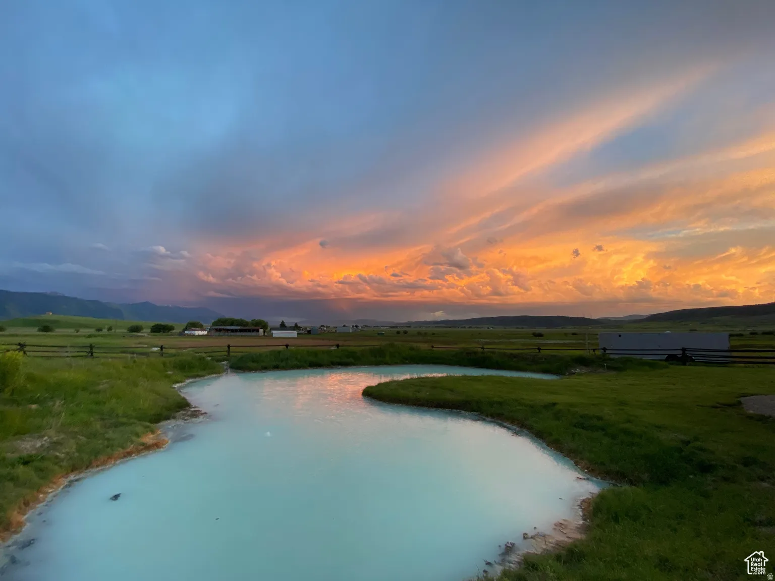 Water view featuring rural landscape and a mountainous background