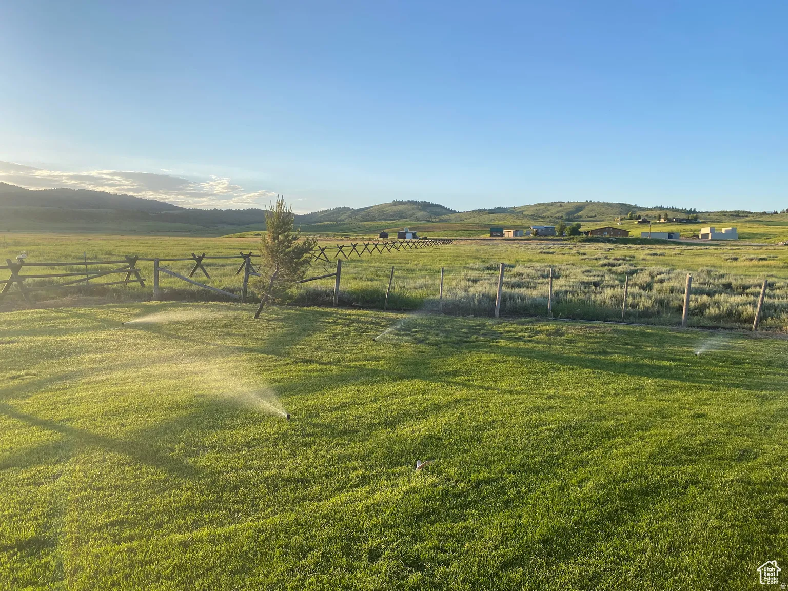View of yard with a view of rural / pastoral area and a mountain view