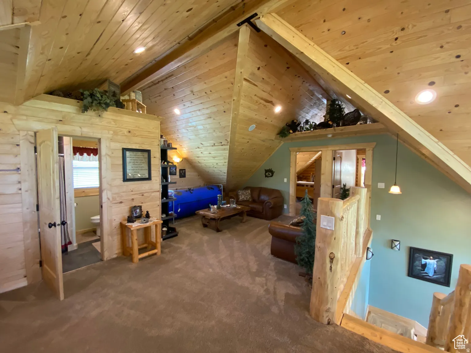 Bonus room featuring a wood ceiling with exposed beams, carpet, and recessed lighting