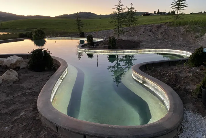Outdoor pool with a rural view