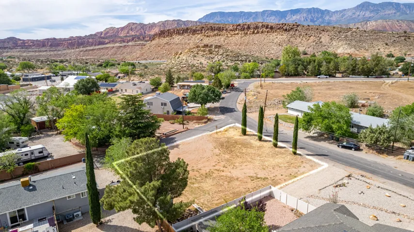 Aerial view of residential area with a mountain backdrop