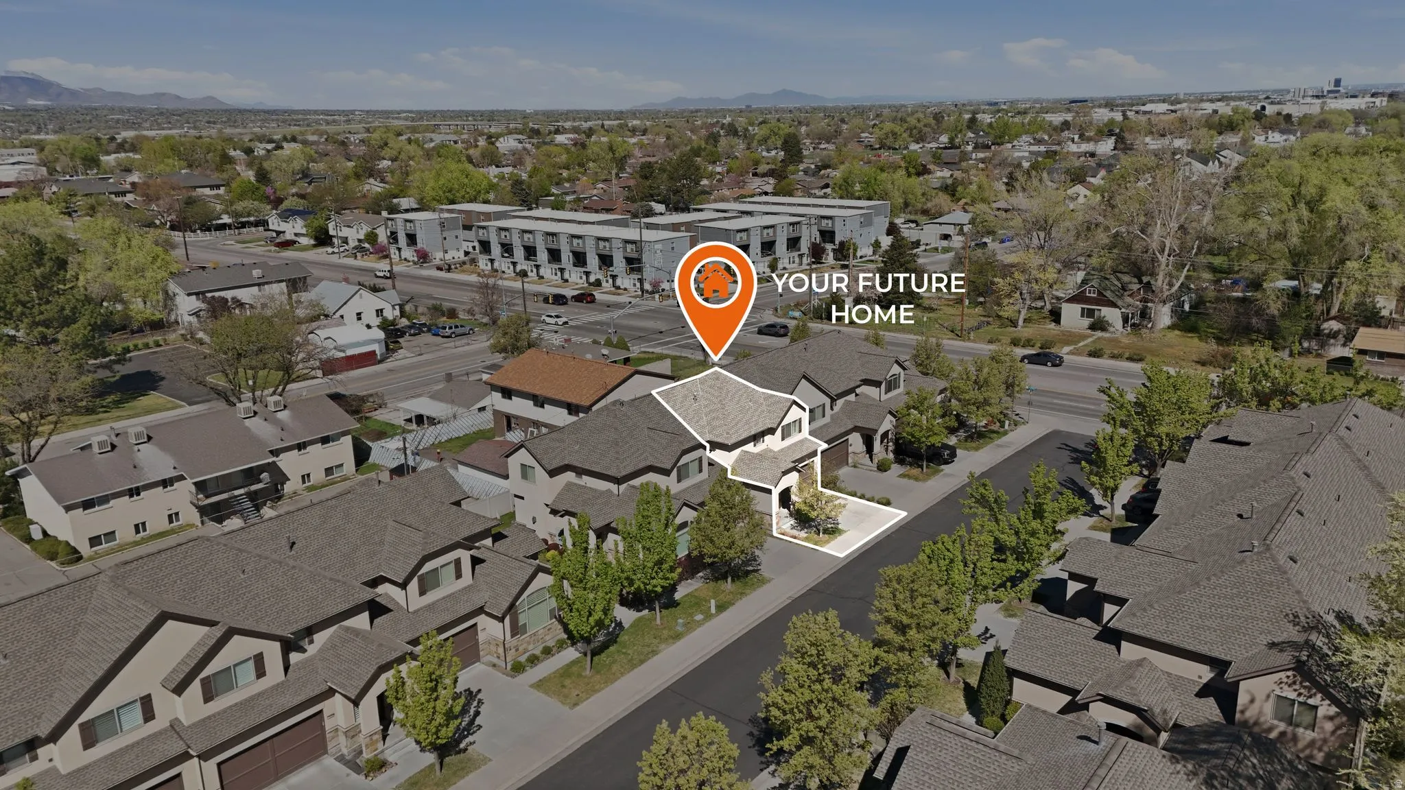 Aerial perspective of suburban area featuring mountains
