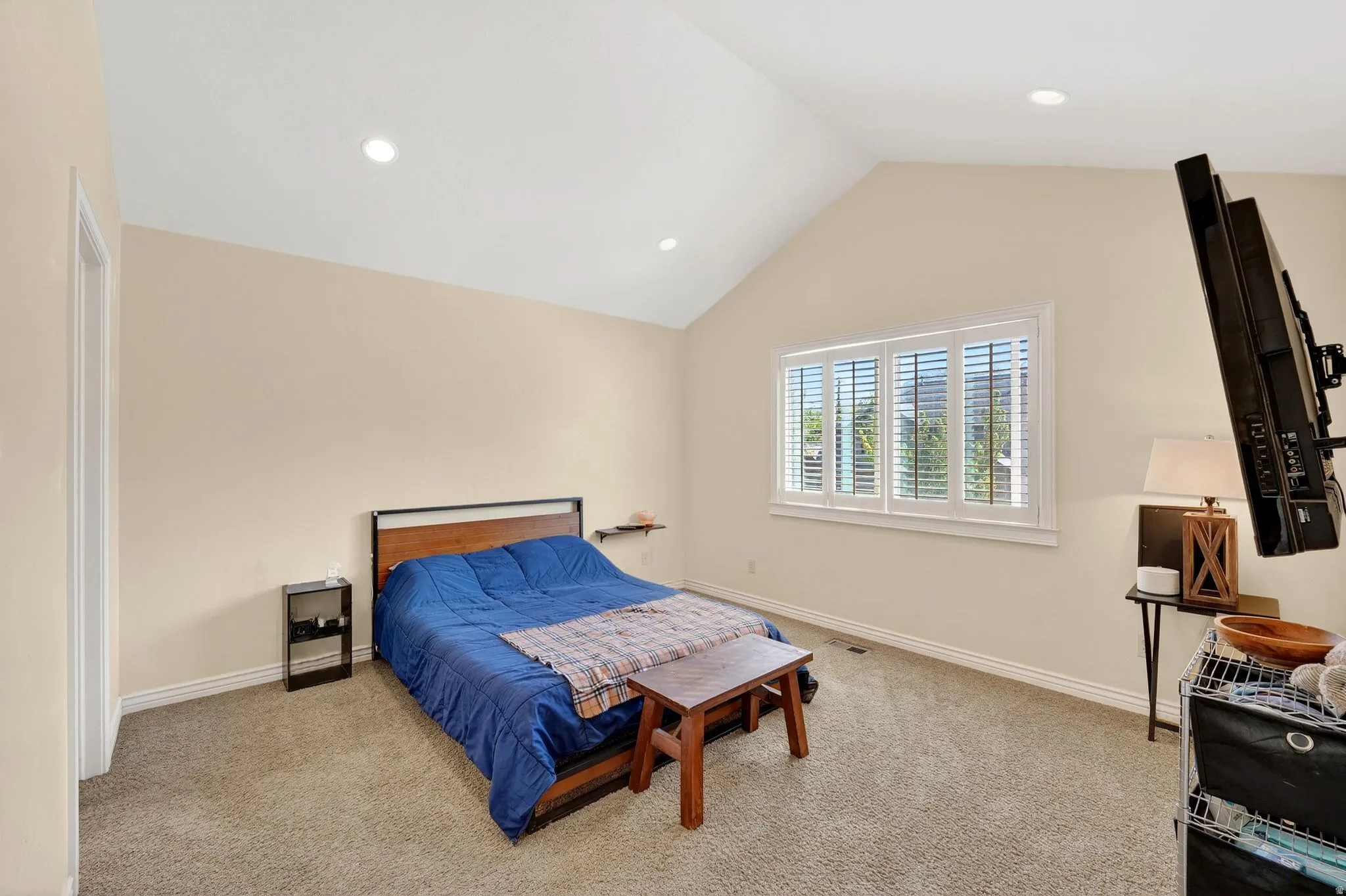 Carpeted bedroom featuring baseboards and recessed lighting
