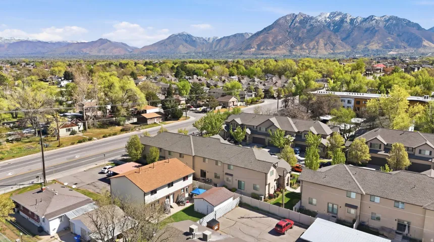 Aerial view of residential area with a mountainous background