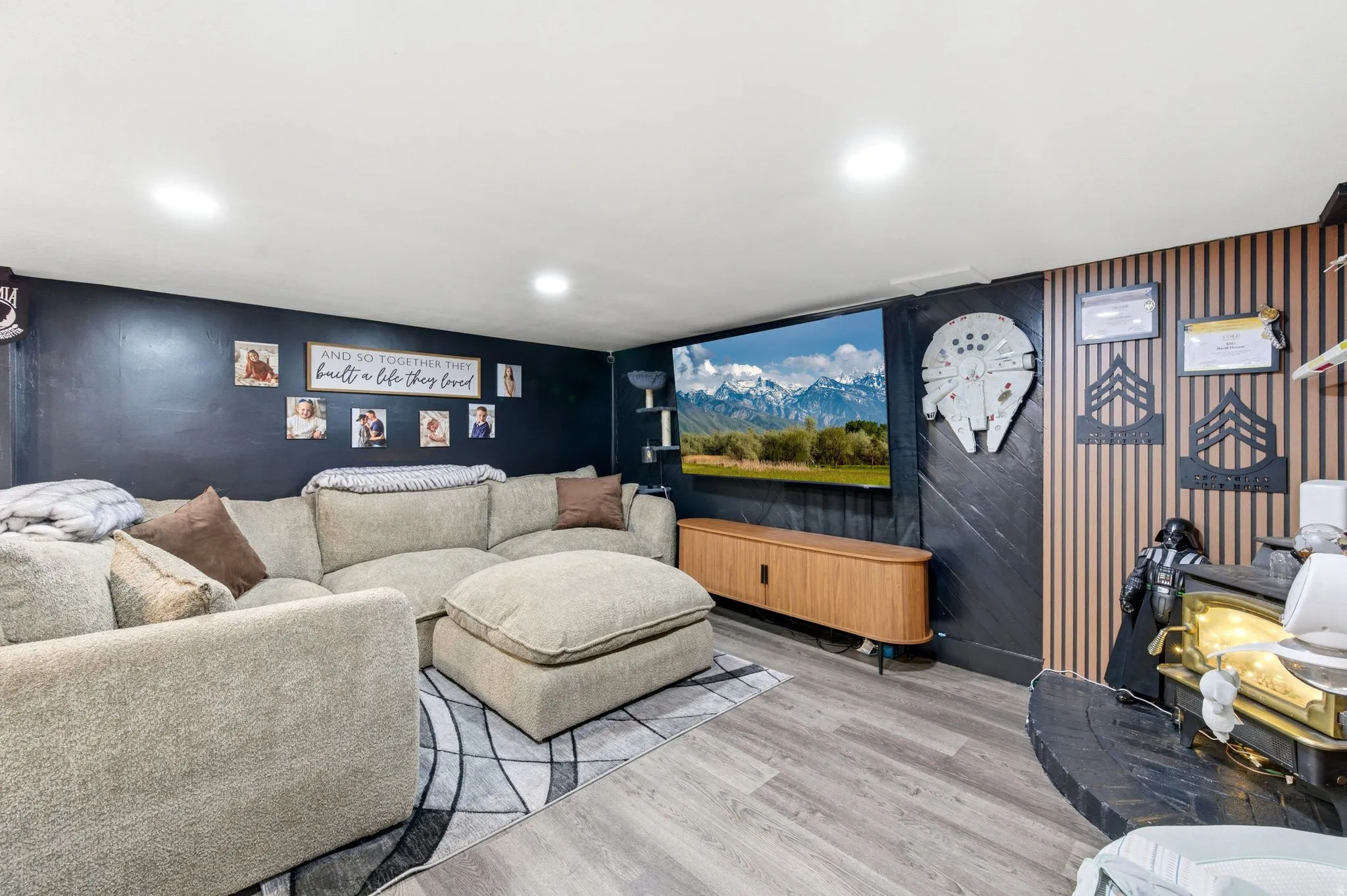 Living area featuring light wood-type flooring and recessed lighting