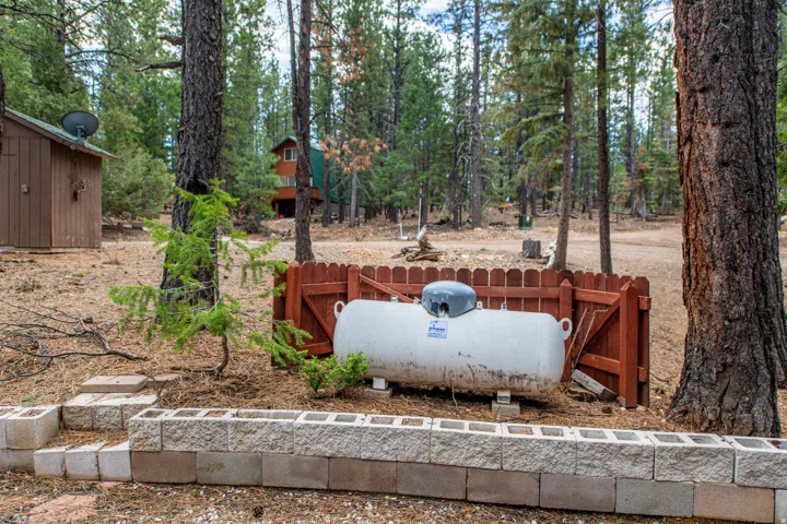 Exterior view of heating fuel tank and a gate