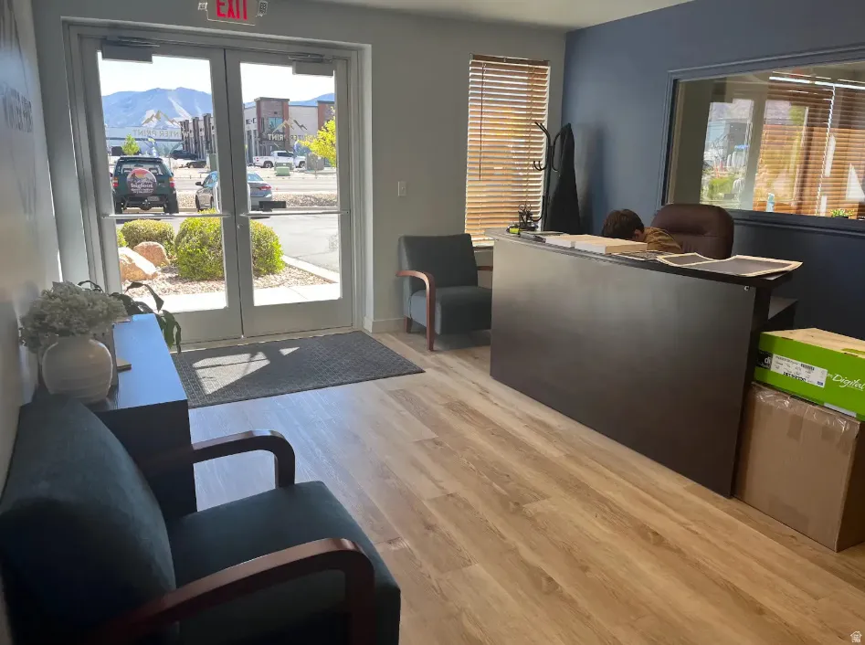 Welcome area featuring french doors and a mountain view