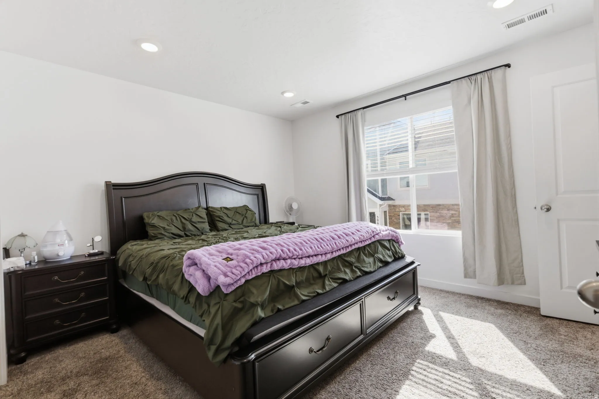 Bedroom featuring carpet and recessed lighting