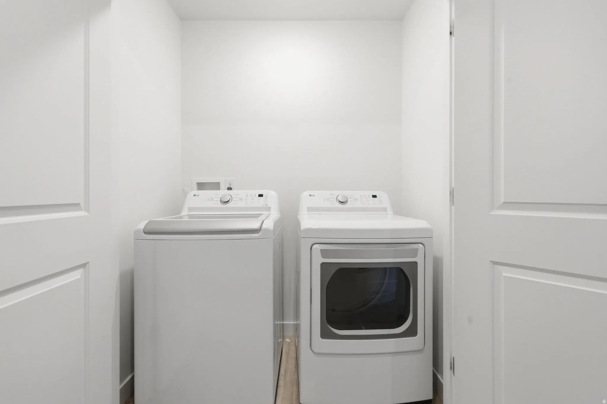 Laundry area featuring washer and clothes dryer
