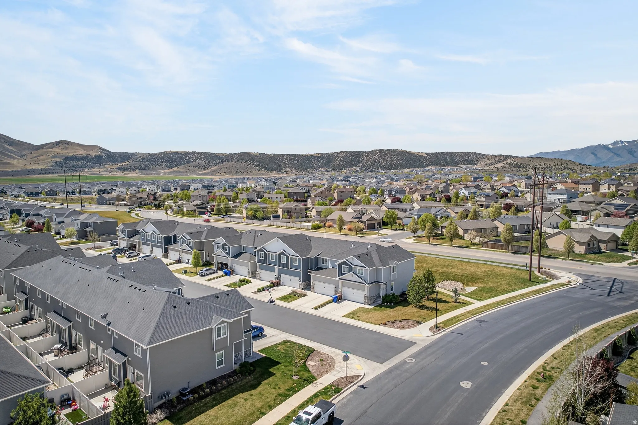 Aerial perspective of suburban area with mountains