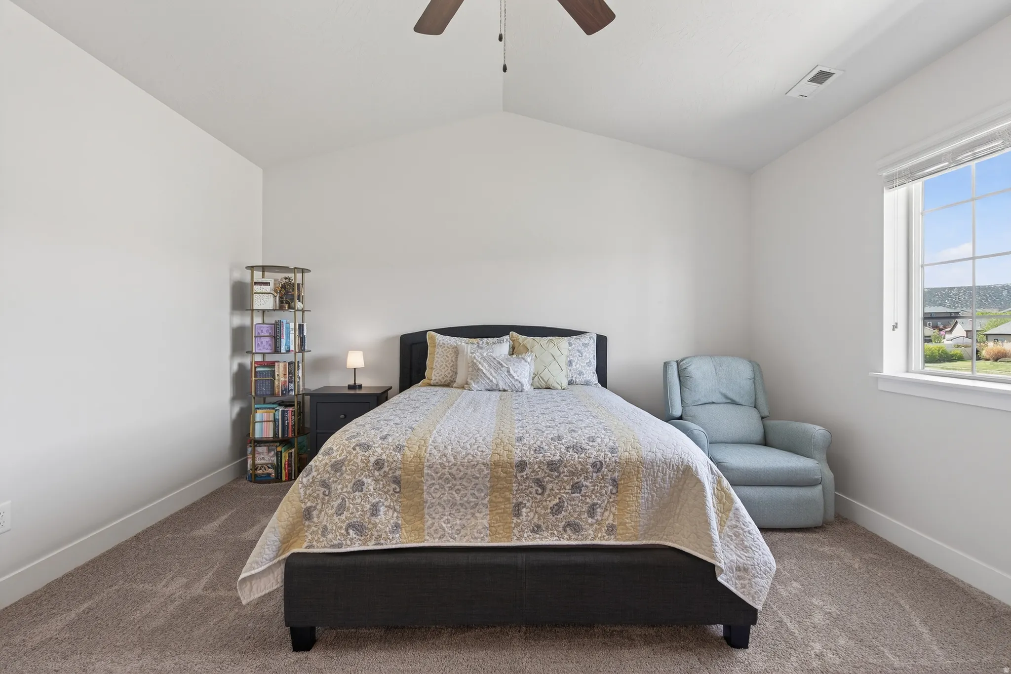 Bedroom featuring carpet flooring and a ceiling fan