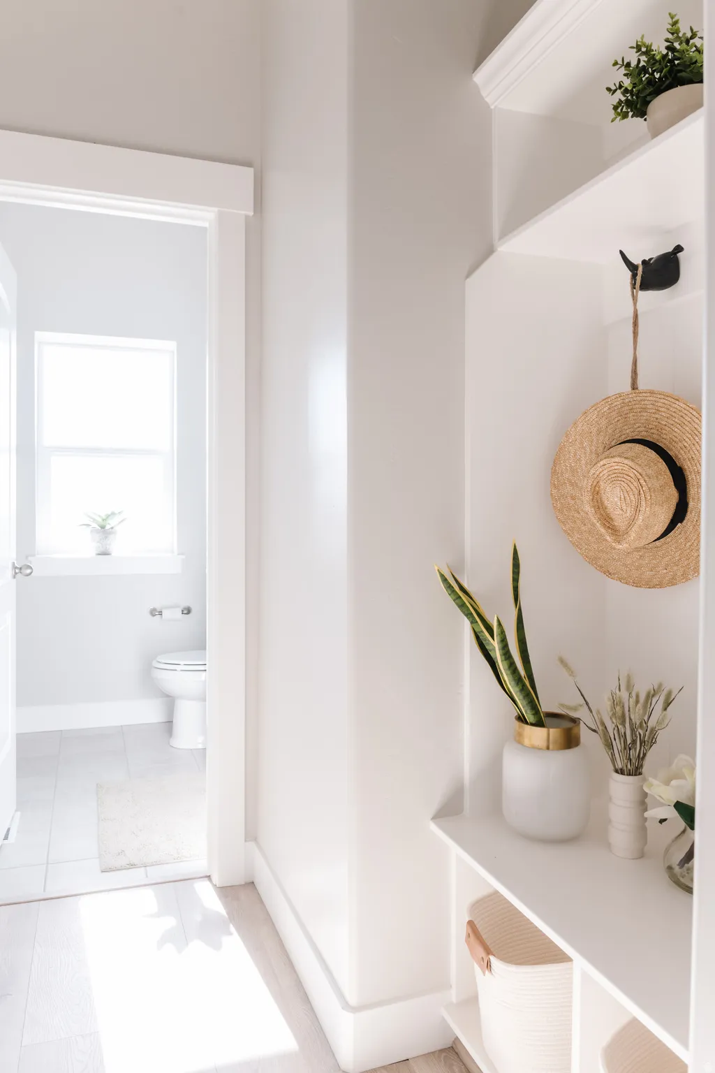 Bathroom with toilet and baseboards
