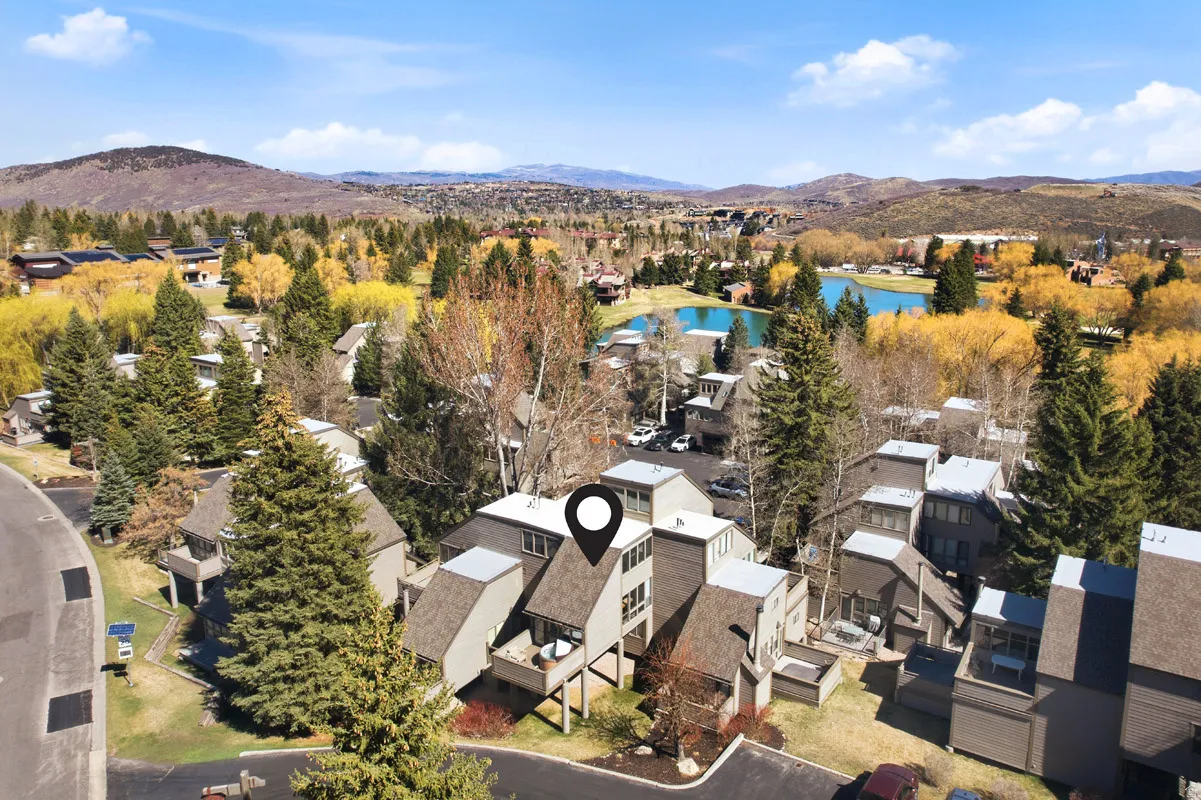 Aerial view of residential area with a water and mountain view