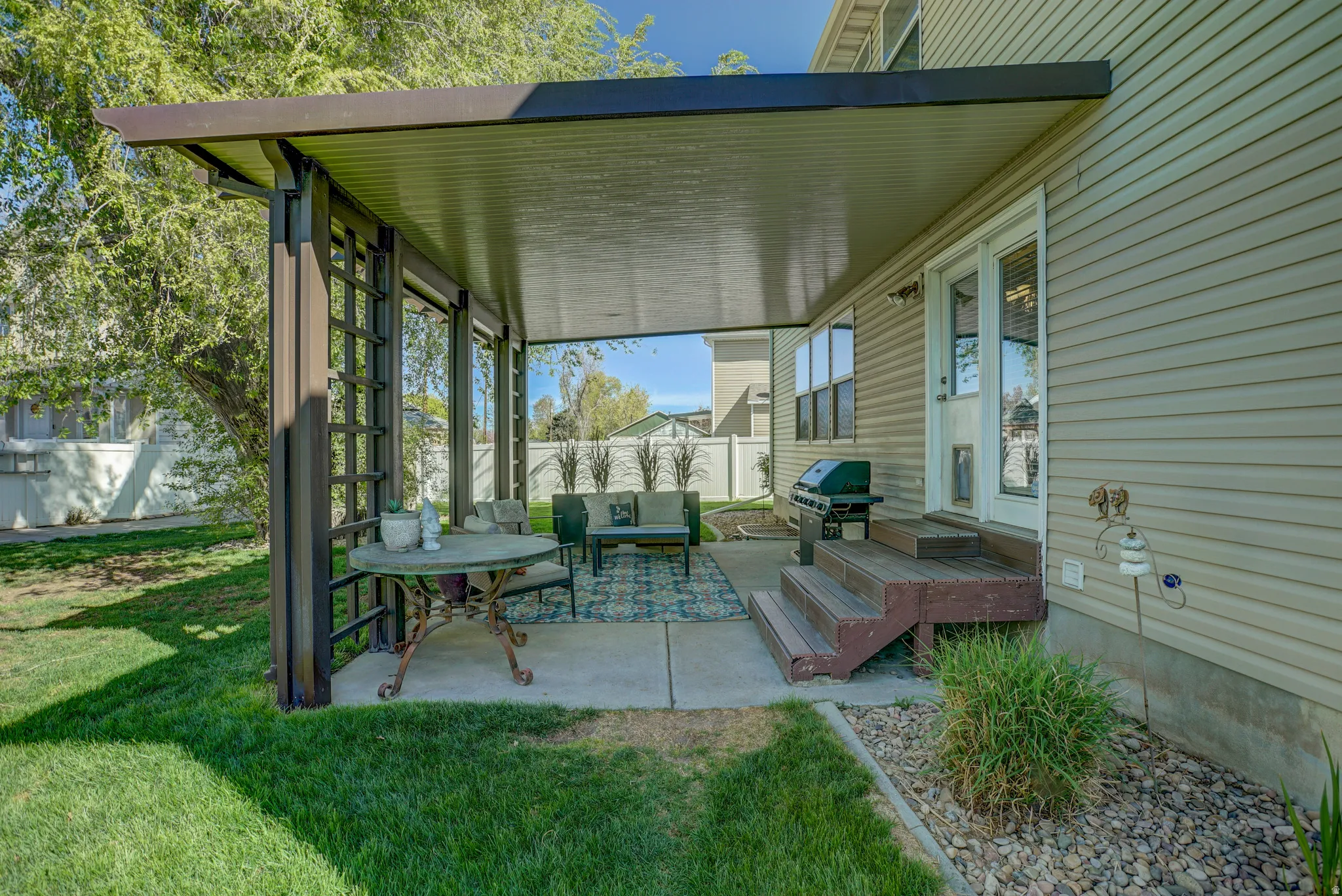 View of patio / terrace featuring grilling area, outdoor seating, and a deck