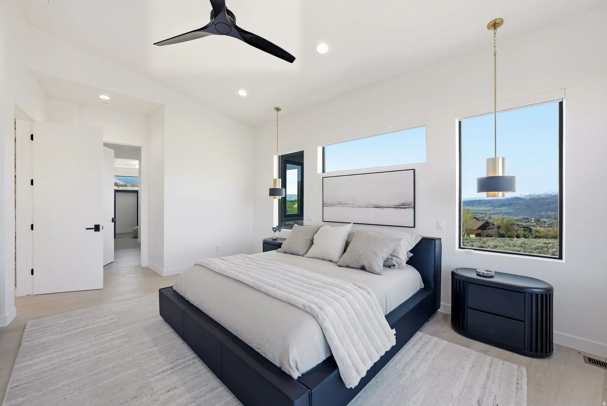 Bedroom with recessed lighting, ceiling fan, and light wood-style floors