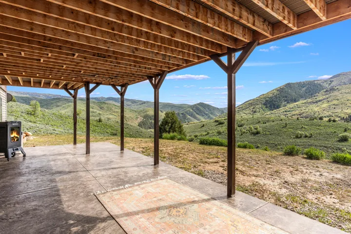 View of patio with a mountain view