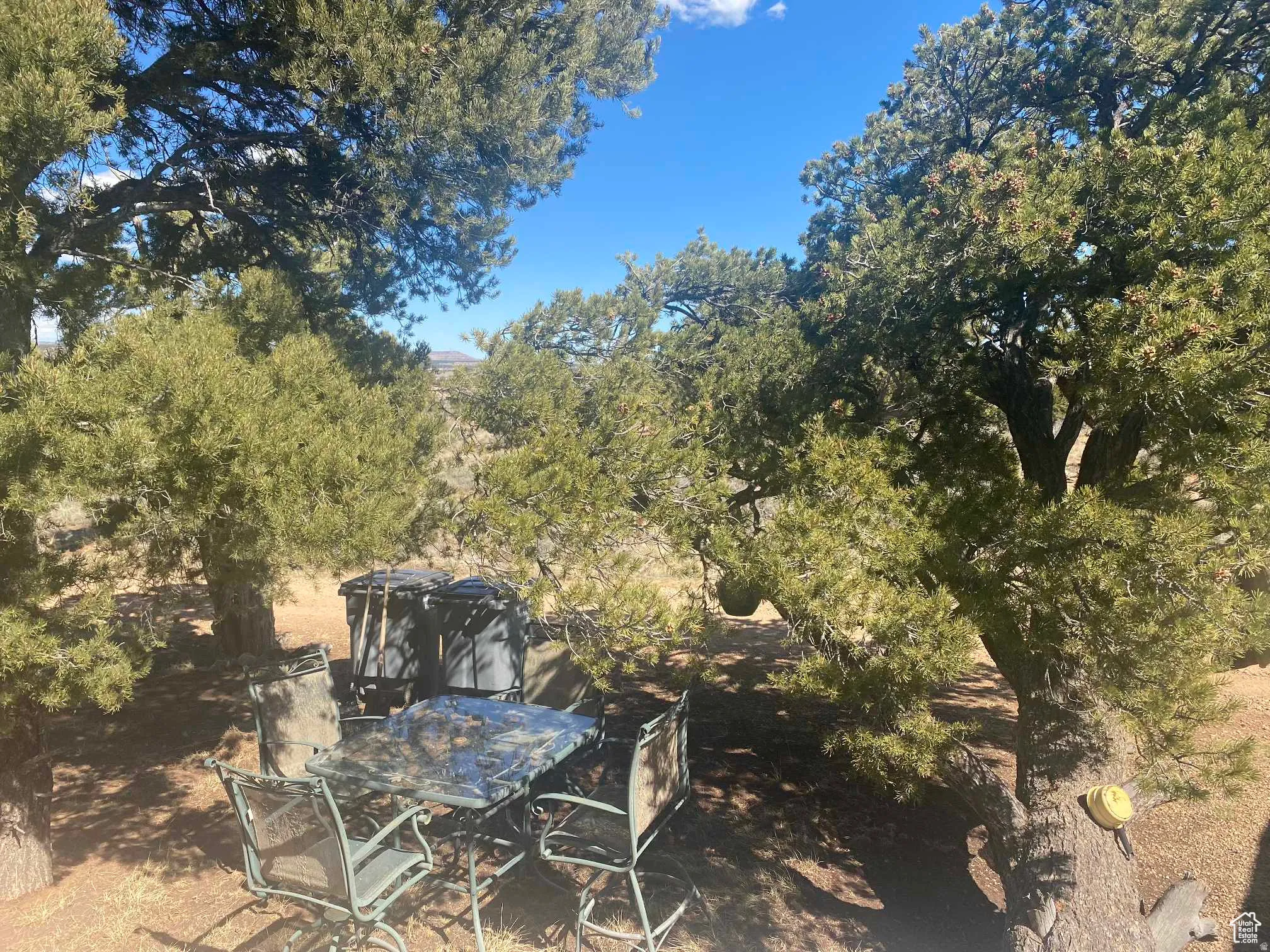 View of yard with outdoor dining space