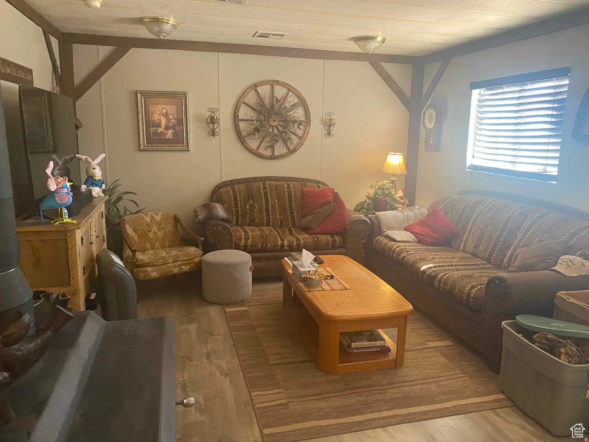 Living area with wood finished floors