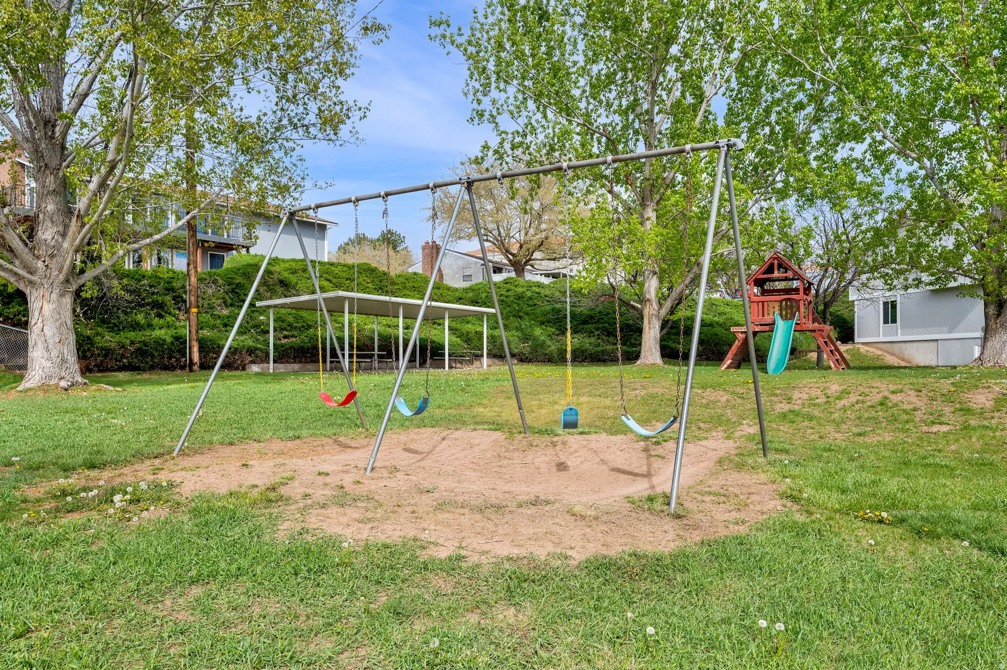 Community playground featuring a yard