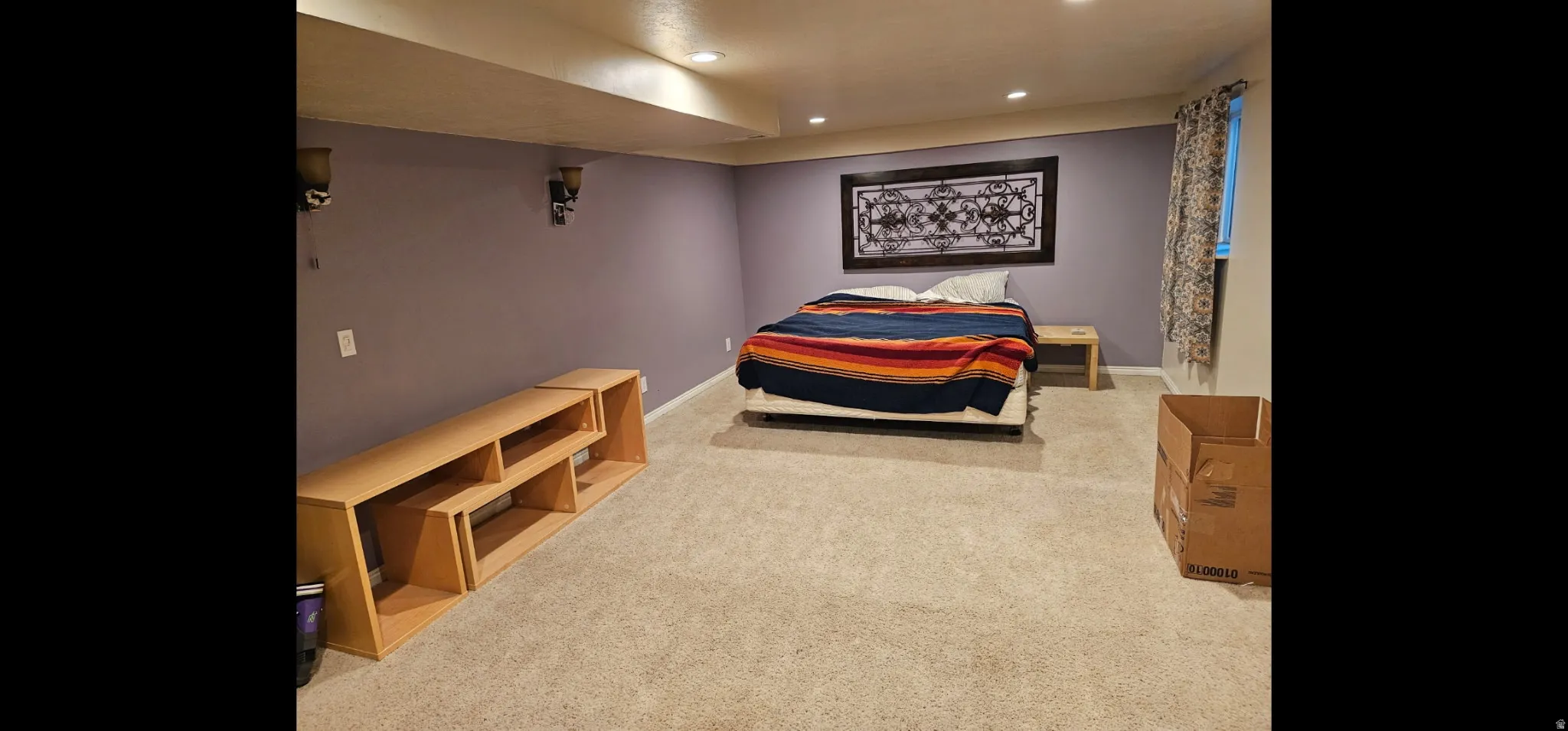 Bedroom featuring light colored carpet and recessed lighting