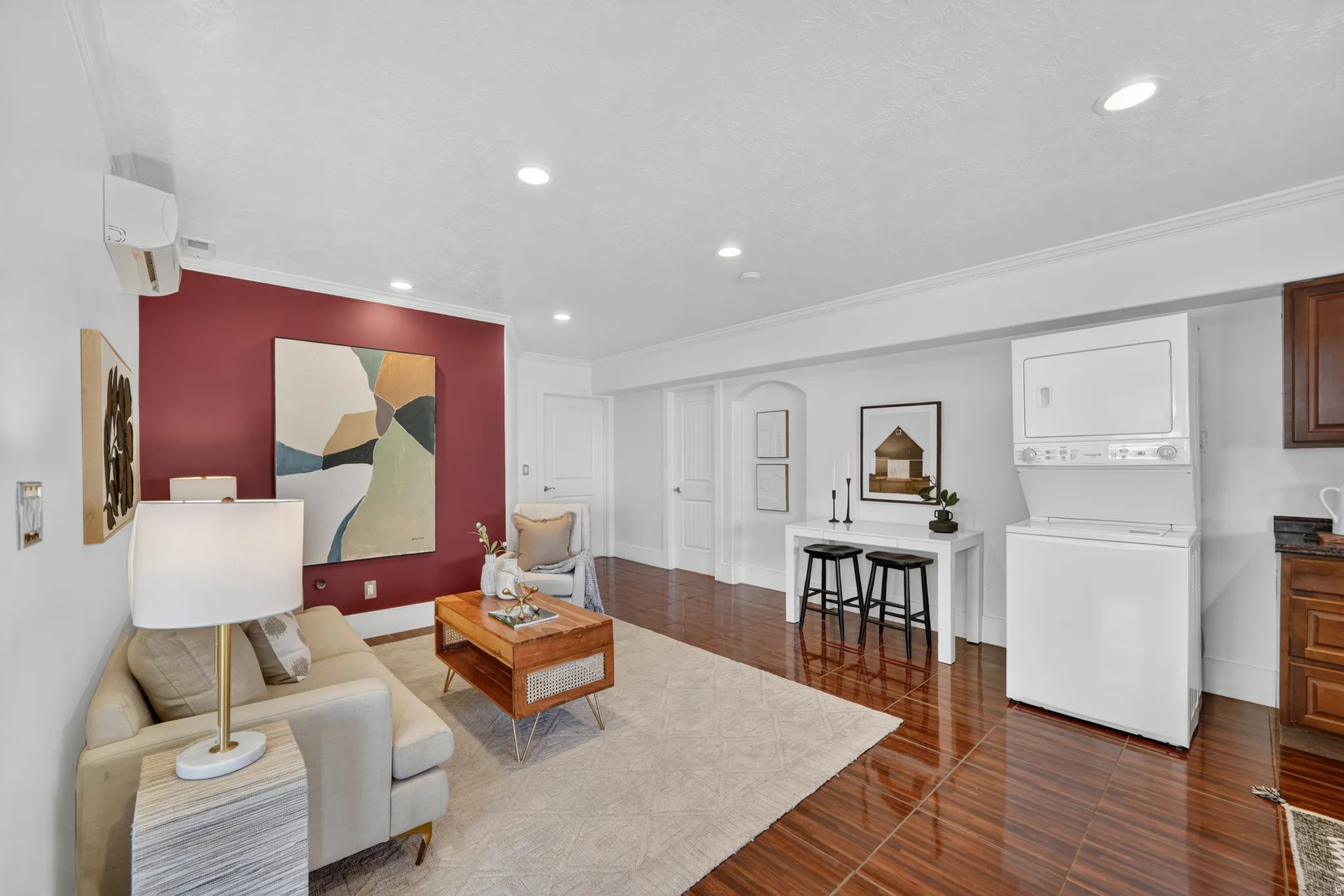 Basement apartment open living space, stackable washer and dryer included.