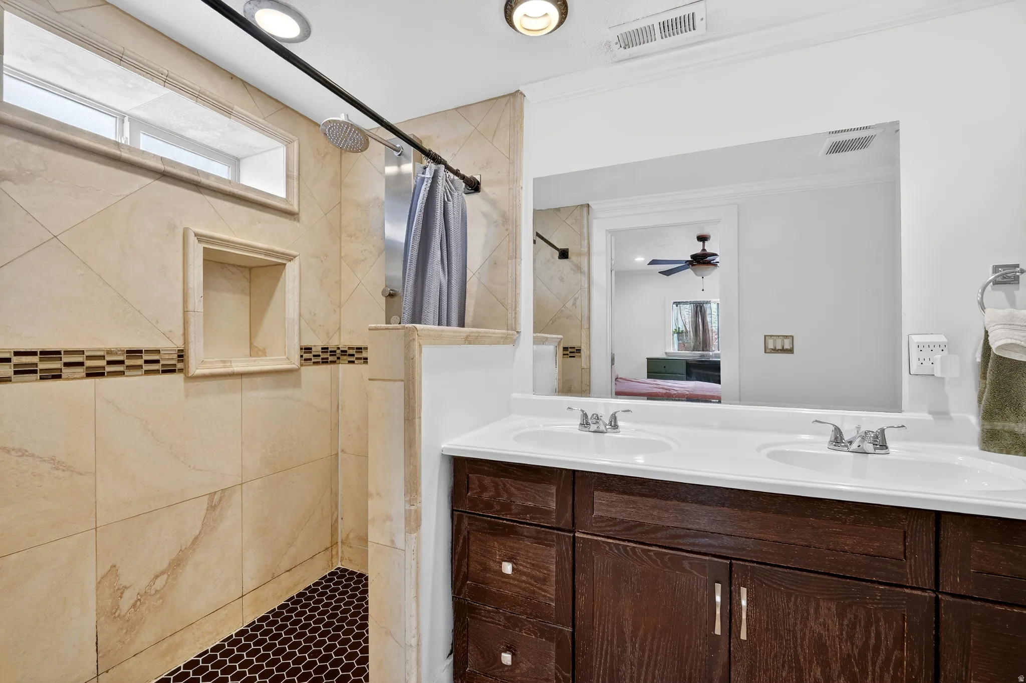 Basement apartment Walk-in shower with tiled walls. Bathroom #4