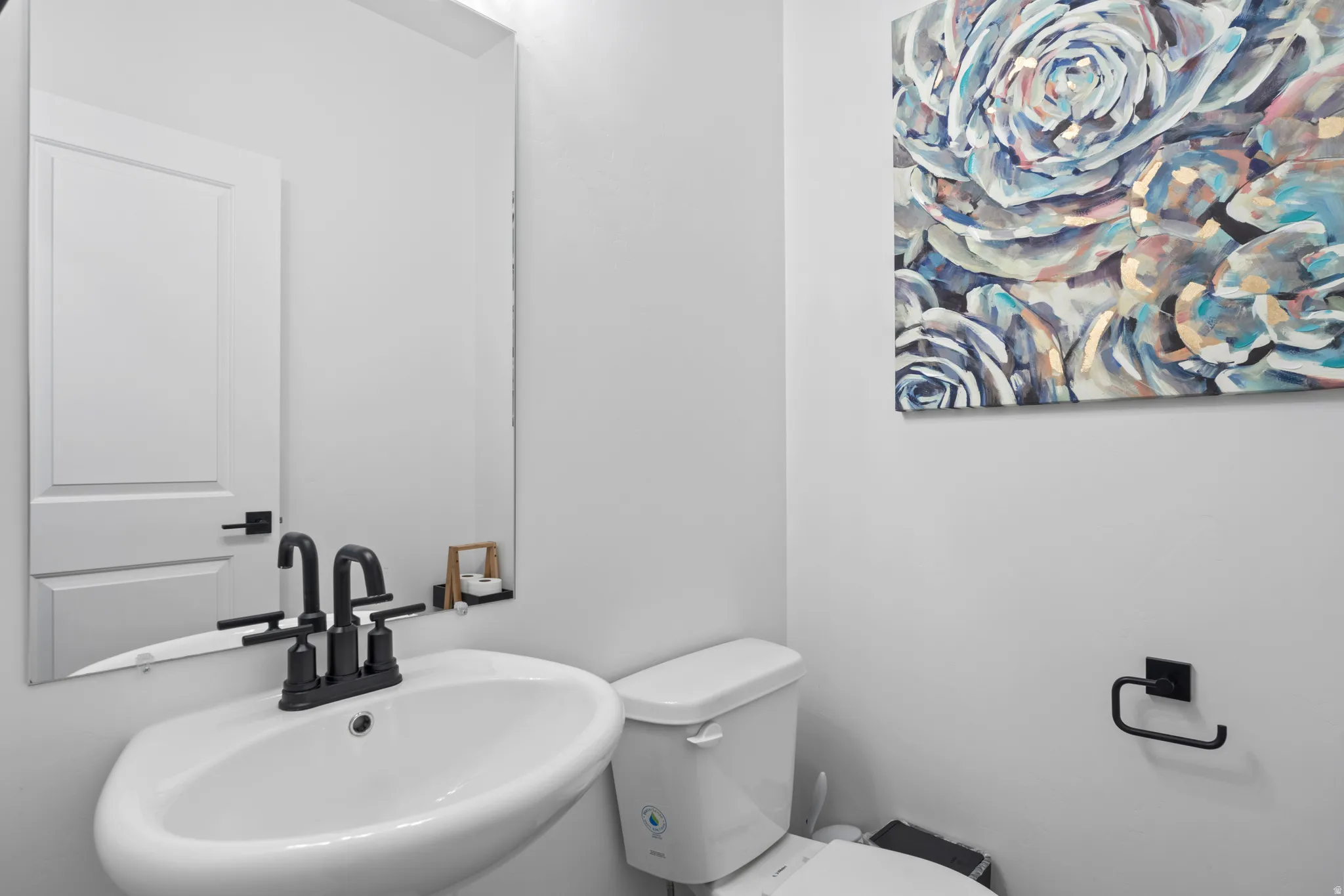 Bathroom with a sink and toilet